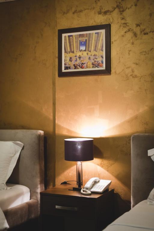 Ένα ή περισσότερα κρεβάτια σε δωμάτιο στο Hotel Keto