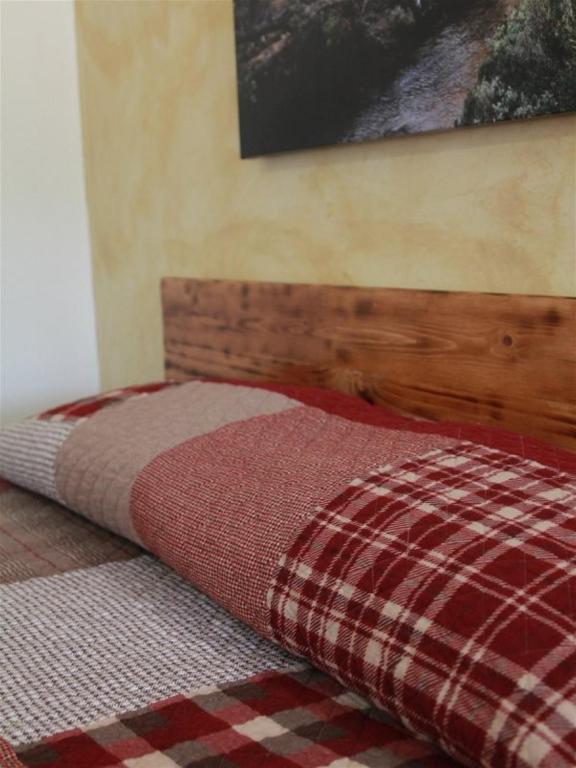 Postel nebo postele na pokoji v ubytování Hurricane Hideaway Lodging