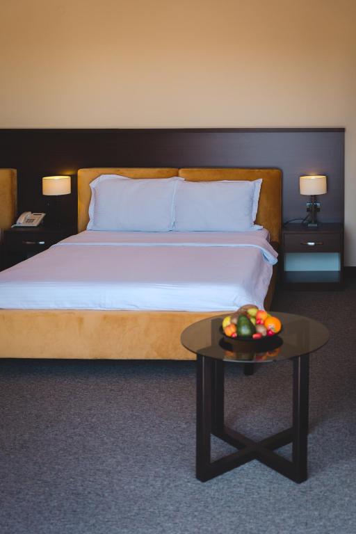 Ένα ή περισσότερα κρεβάτια σε δωμάτιο στο Hotel Keto