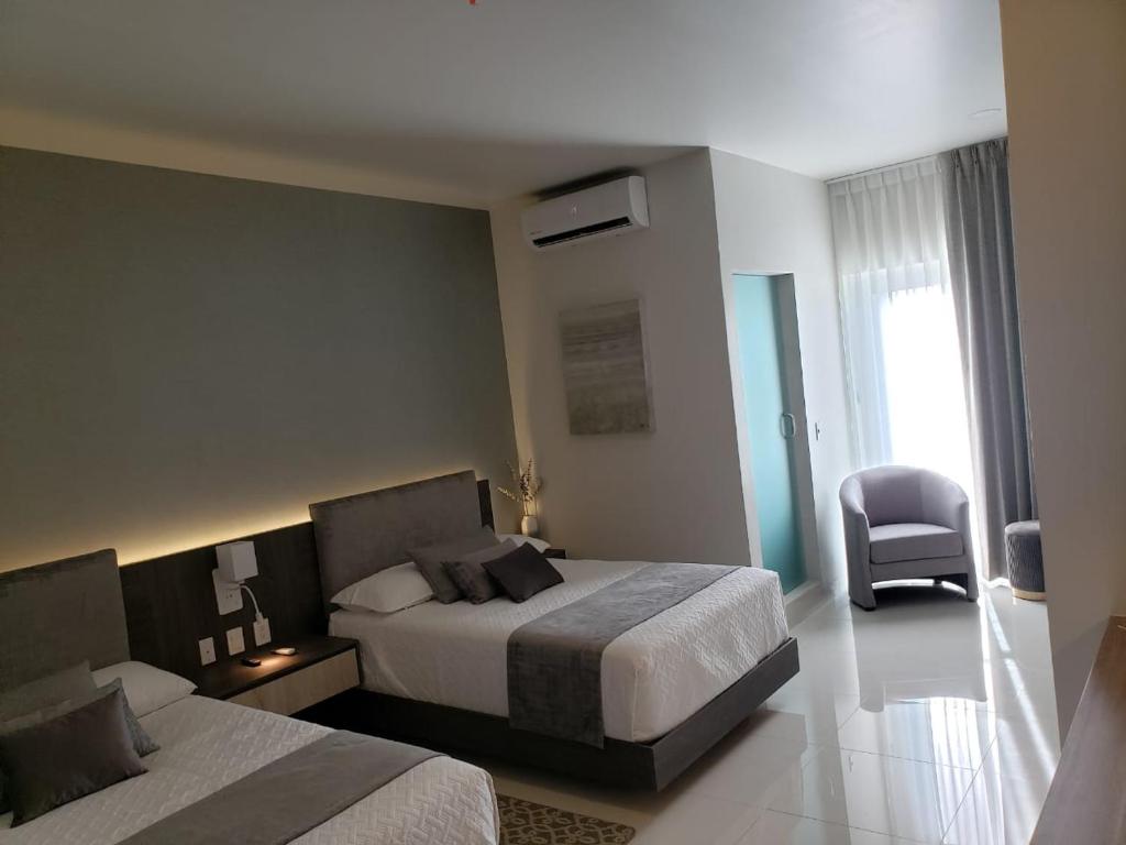 Postel nebo postele na pokoji v ubytování Sara N Hotel & Spa