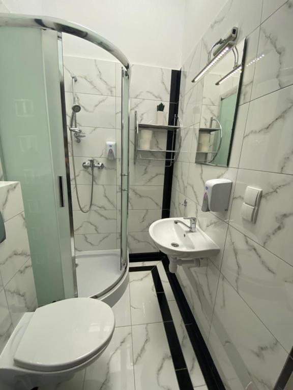 Kúpeľňa v ubytovaní Apartamenty Olsztyn