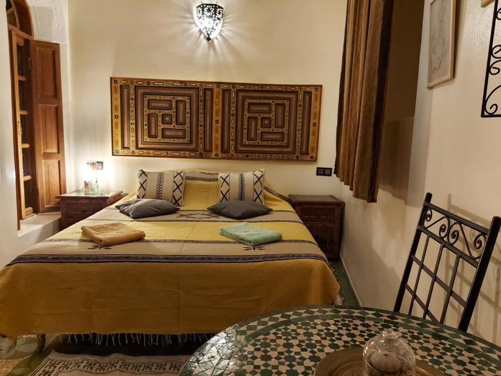 Cama o camas de una habitación en Dar Hayati