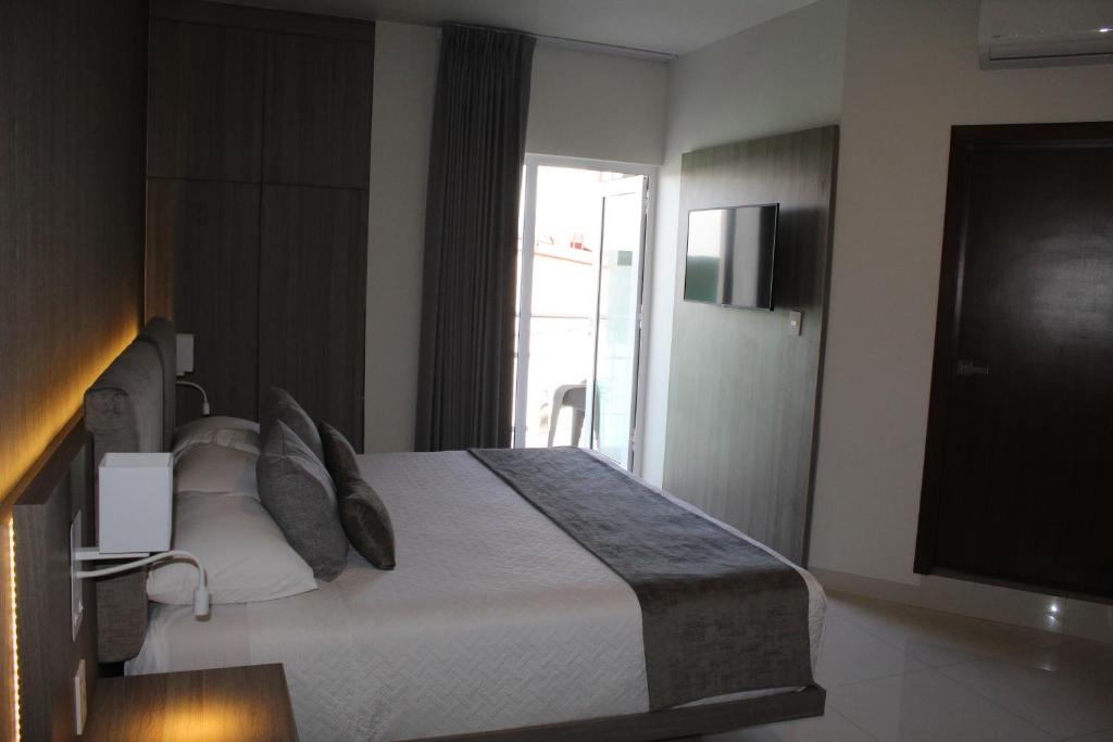 Postel nebo postele na pokoji v ubytování Sara N Hotel & Spa