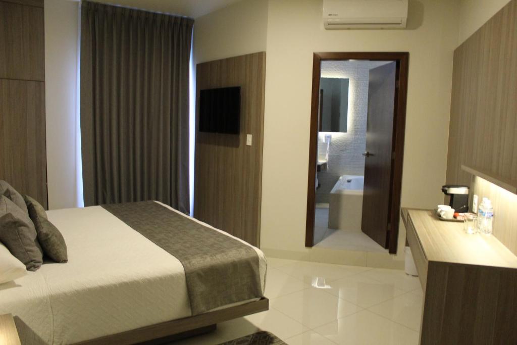 Postel nebo postele na pokoji v ubytování Sara N Hotel & Spa