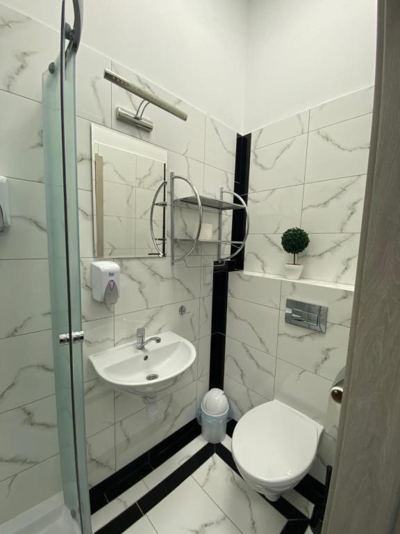 Kúpeľňa v ubytovaní Apartamenty Olsztyn