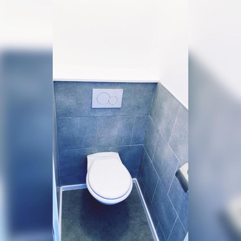 Koupelna v ubytování Au logement mosan