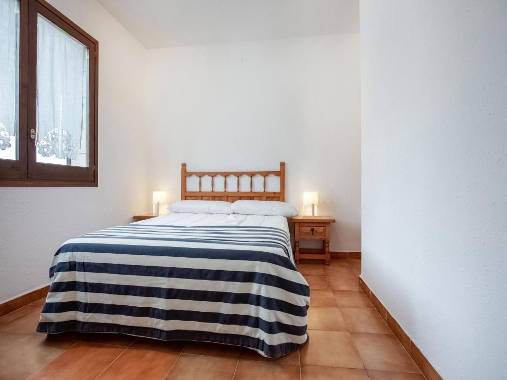 Posteľ alebo postele v izbe v ubytovaní Belvilla by OYO Ca la Yoli