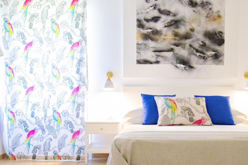 Postel nebo postele na pokoji v ubytování Volver B&B