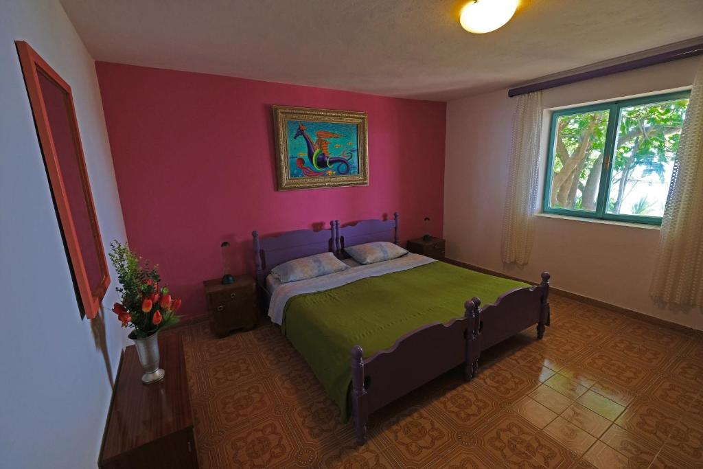 Postel nebo postele na pokoji v ubytování The View Stara Baška