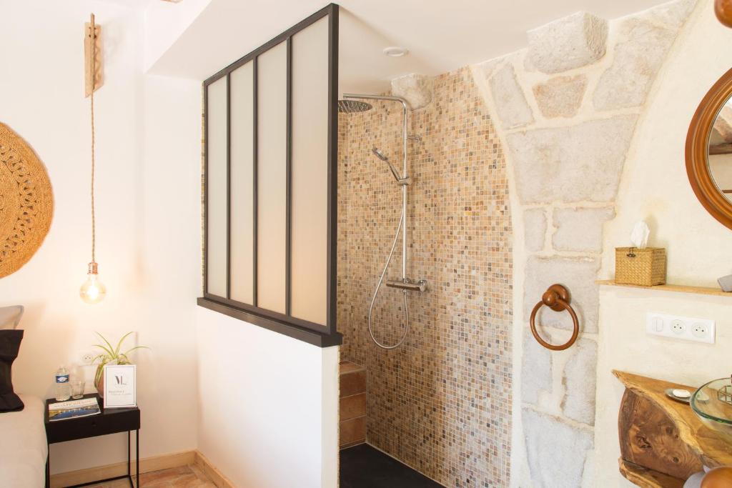 Koupelna v ubytování Maison Lapopie chambres et gîte