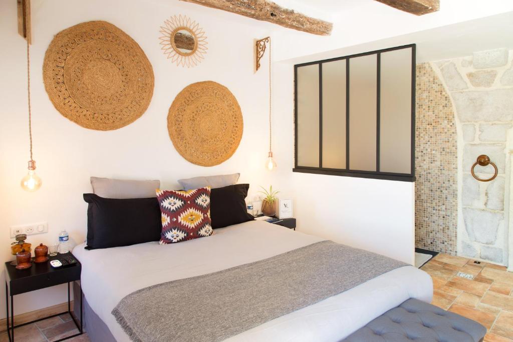 Postel nebo postele na pokoji v ubytování Maison Lapopie chambres et gîte