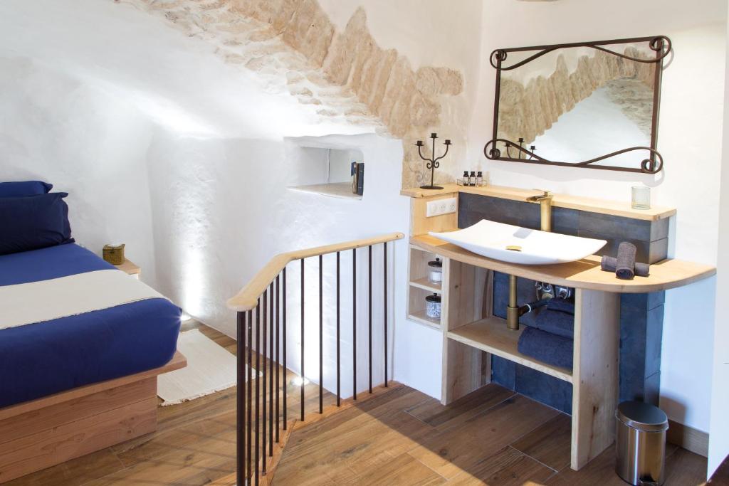 Postel nebo postele na pokoji v ubytování Maison Lapopie chambres et gîte