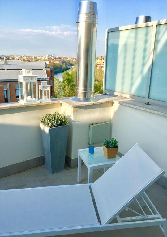 Balkon lub taras w obiekcie Terrace with Tiber View - Trastevere
