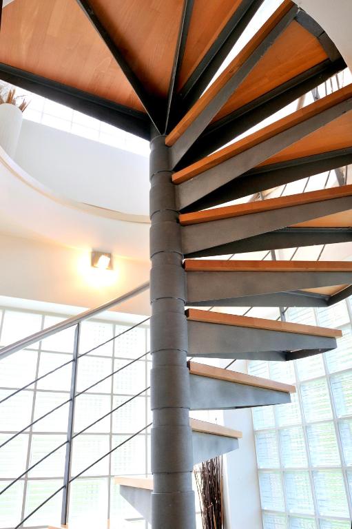 a column in a room with a large window at Sani Polyastron Hotel & Spa in Sani Beach
