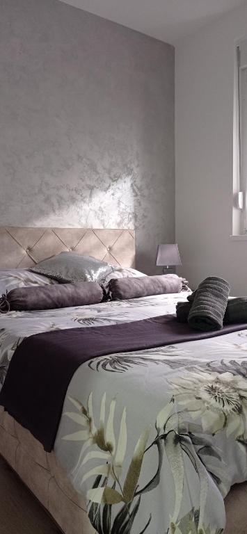 Postel nebo postele na pokoji v ubytování Apartman SILVER
