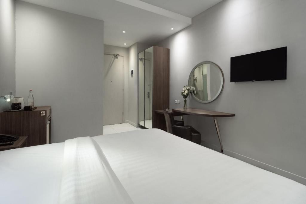TV a/nebo společenská místnost v ubytování Sun Boutique Hotel