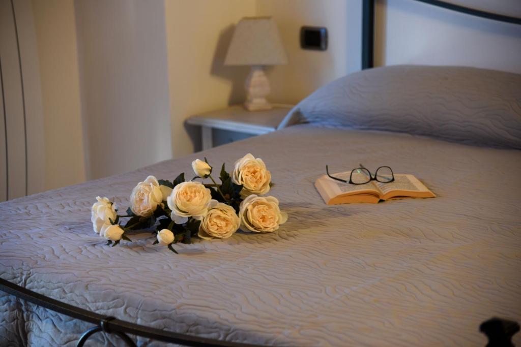 Postel nebo postele na pokoji v ubytování Villa Ginevra-Villa Indipendente-Crete Senesi-Tuscany