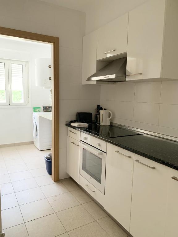 Kuchyň nebo kuchyňský kout v ubytování APARTAMENTO LABEGAIN 2