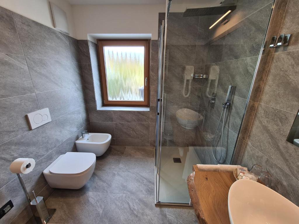 Koupelna v ubytování Hotel Piedibosco
