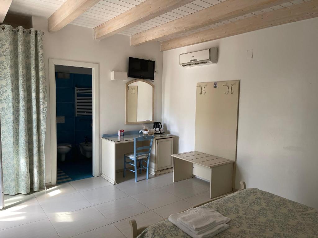 Kuchyň nebo kuchyňský kout v ubytování Baia Sangiorgio Hotel & Beach Club