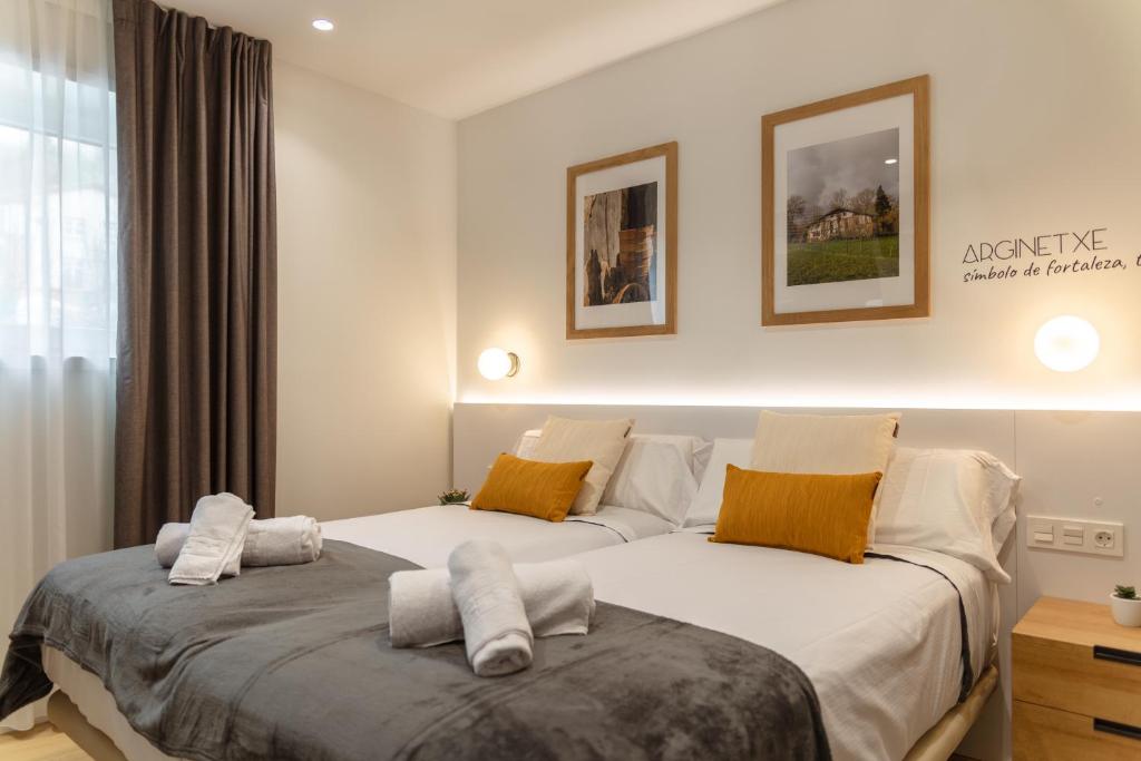 Postel nebo postele na pokoji v ubytování HOTEL ORDIZIA
