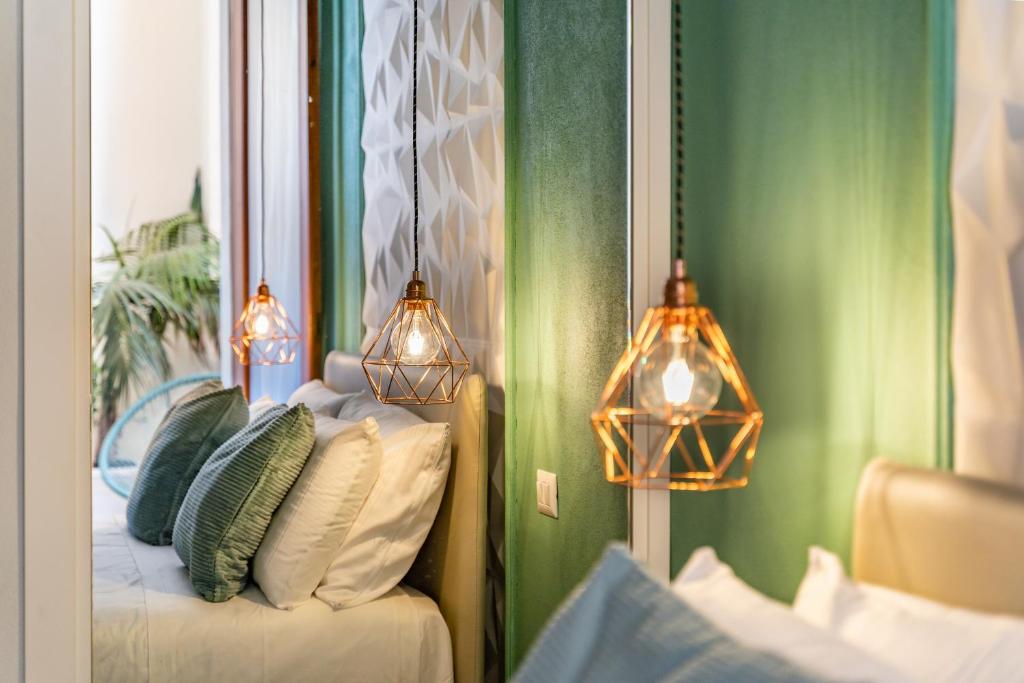 Posteľ alebo postele v izbe v ubytovaní Domus Laetitiae Rooms & Apartments