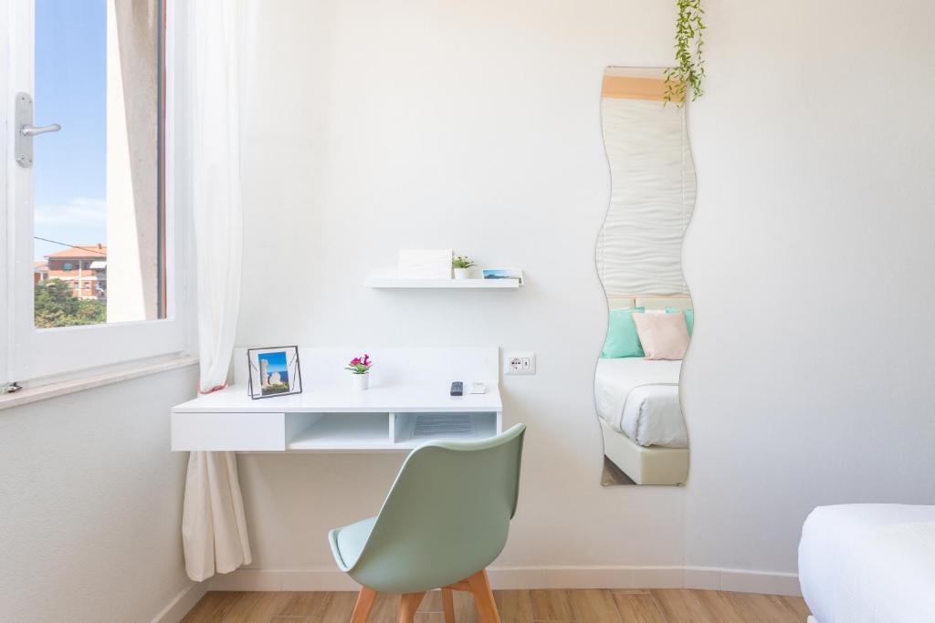 Posteľ alebo postele v izbe v ubytovaní Domus Laetitiae Rooms & Apartments