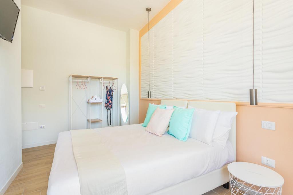 Posteľ alebo postele v izbe v ubytovaní Domus Laetitiae Rooms & Apartments