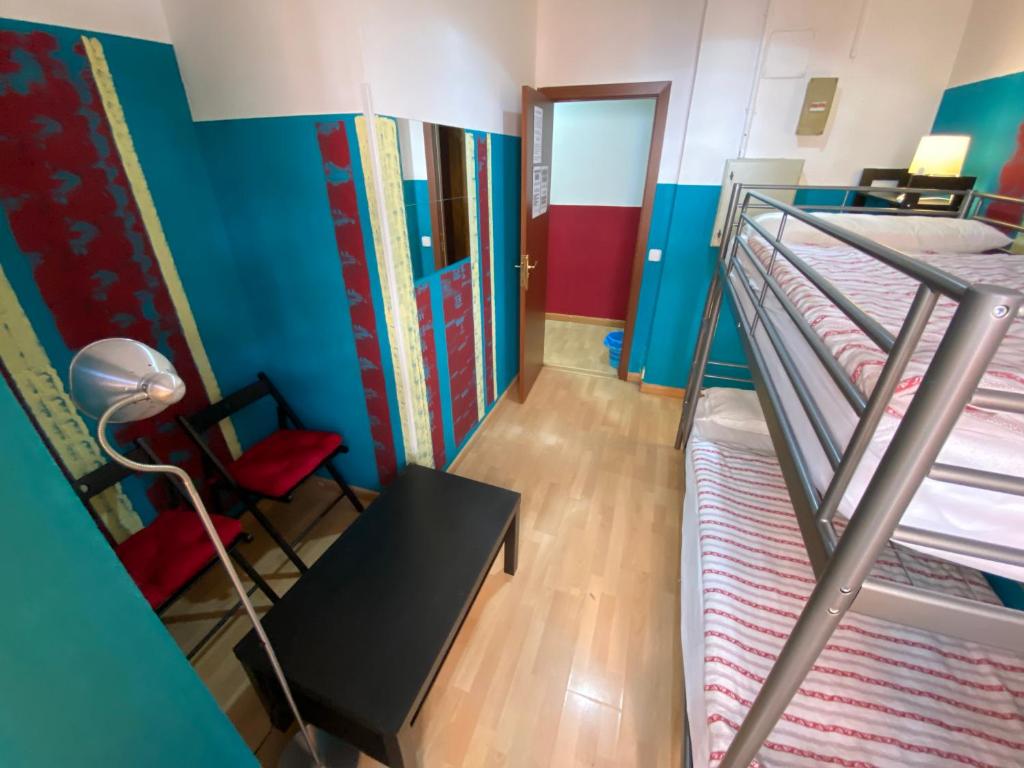 A kitchen or kitchenette at Bed Madrid Rooms by Bossh! Hotels