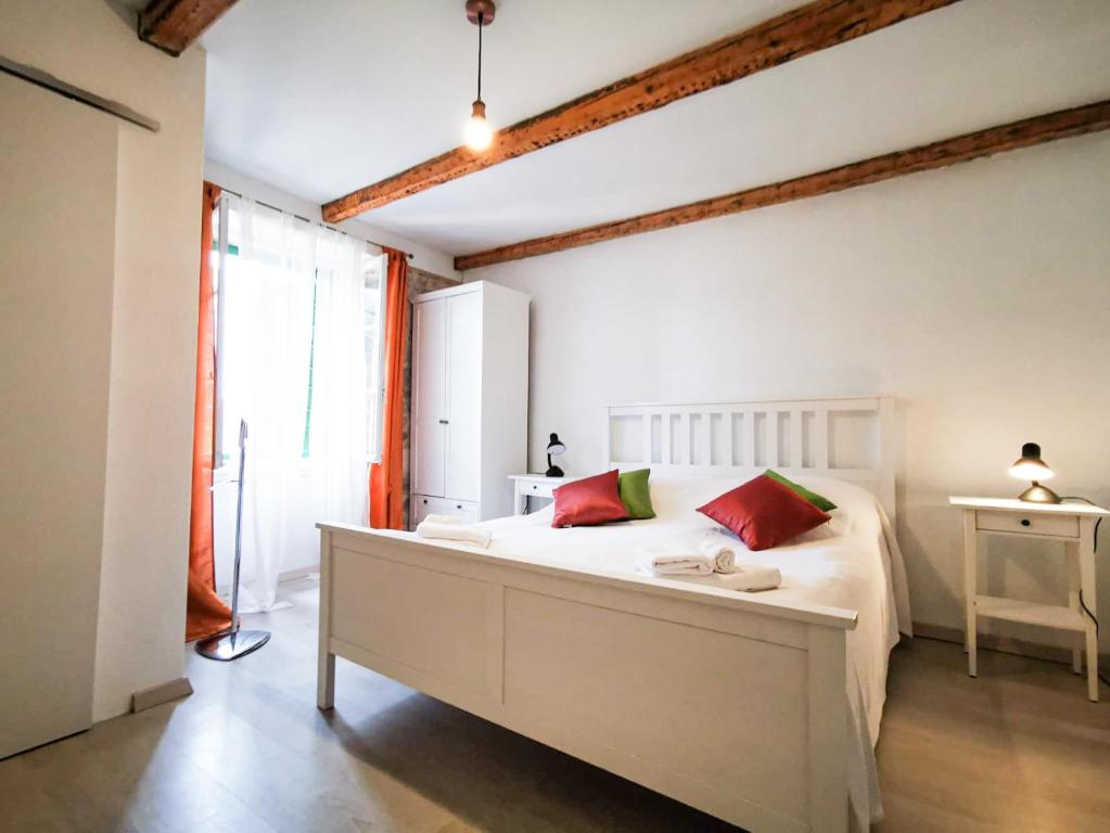 Ένα ή περισσότερα κρεβάτια σε δωμάτιο στο Val Comeza
