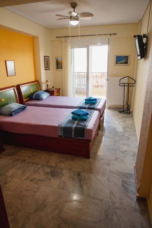 Posteľ alebo postele v izbe v ubytovaní Sunray luxury apartment Volos