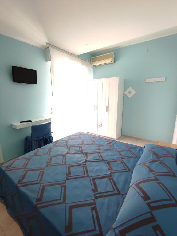 Postel nebo postele na pokoji v ubytování Villa Mirella-NUOVA GESTIONE