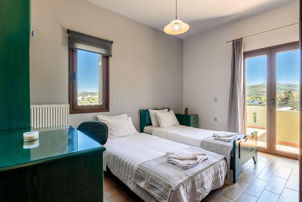 Posteľ alebo postele v izbe v ubytovaní Eleni's Villa 'TOP DESTINATION'