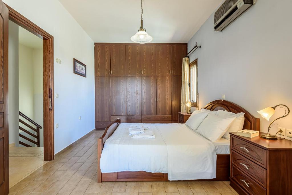 Posteľ alebo postele v izbe v ubytovaní Eleni's Villa 'TOP DESTINATION'