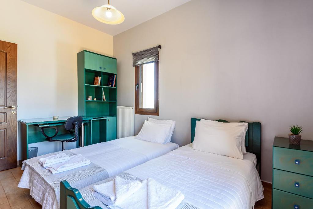 Posteľ alebo postele v izbe v ubytovaní Eleni's Villa 'TOP DESTINATION'