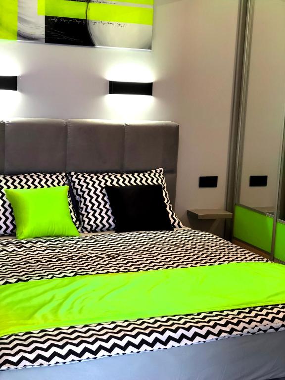 Posteľ alebo postele v izbe v ubytovaní APARTAMENT ELEGANCE GREEN w Nautica Resort