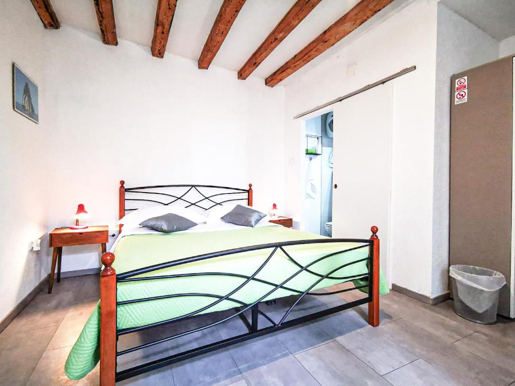 Postel nebo postele na pokoji v ubytování Val Comeza