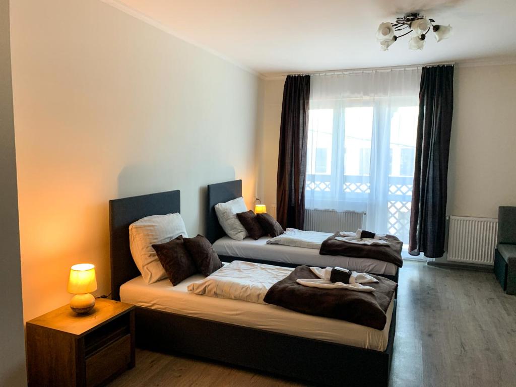 Postel nebo postele na pokoji v ubytování Aranykorona Hotel