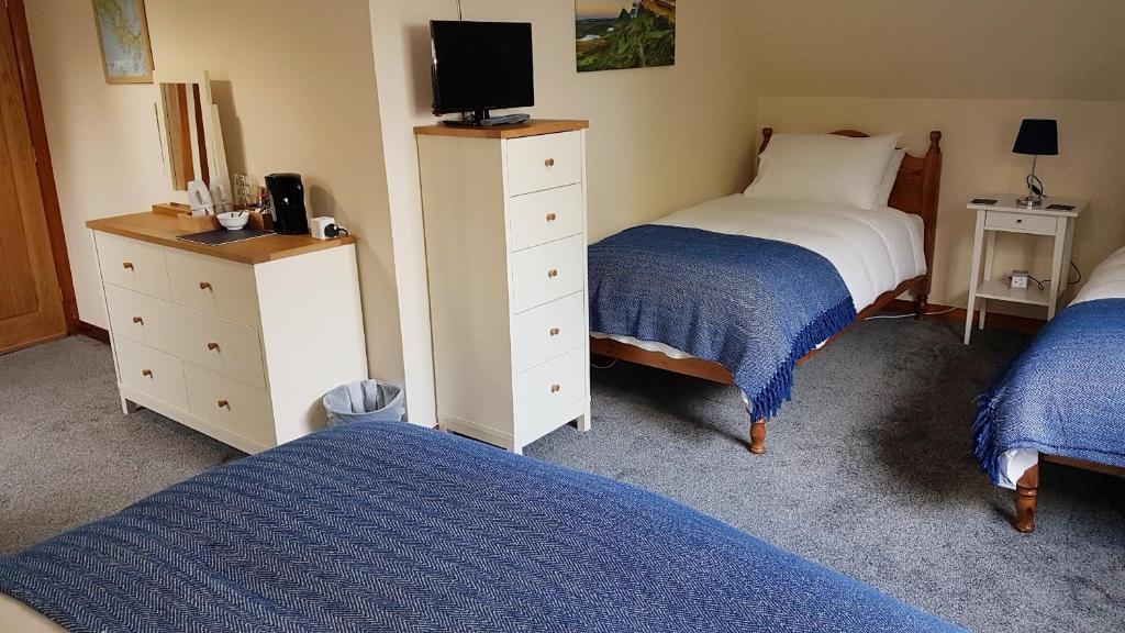Postel nebo postele na pokoji v ubytování Moorside Rooms