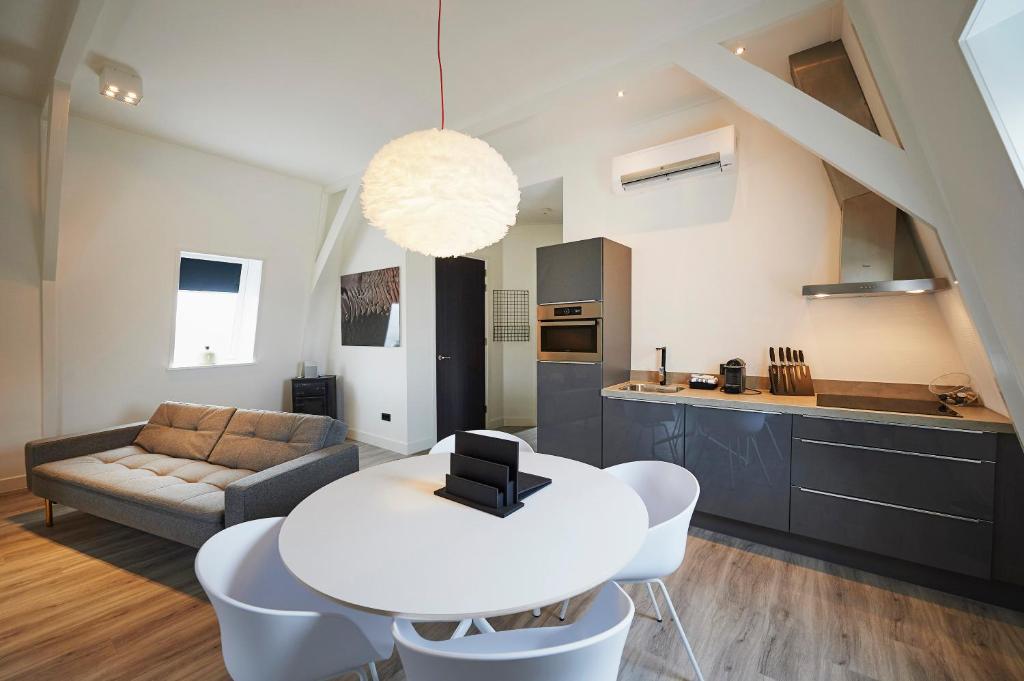 Kuchyň nebo kuchyňský kout v ubytování "DE BANK" - Hotel Apartments