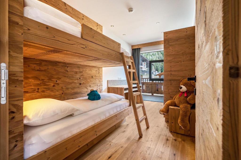 Postel nebo postele na pokoji v ubytování App Mulin Tondl mit Sauna