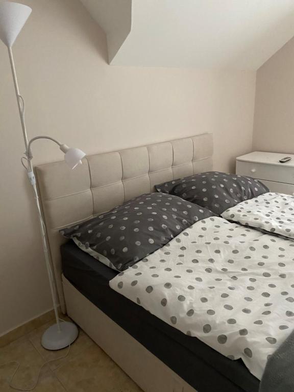 Łóżko lub łóżka w pokoju w obiekcie Villa Scamard