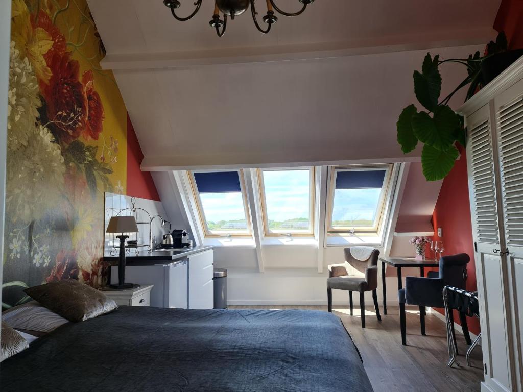 Postel nebo postele na pokoji v ubytování Logement Hellevoetsluis
