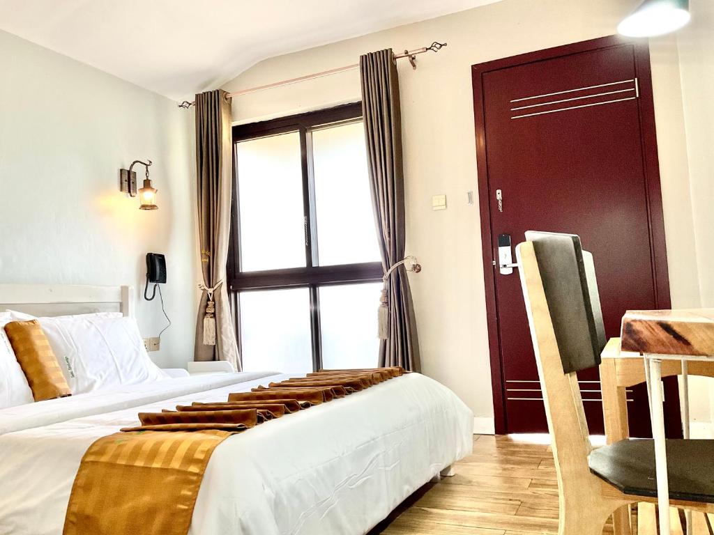Postel nebo postele na pokoji v ubytování Zebi Ecolodge