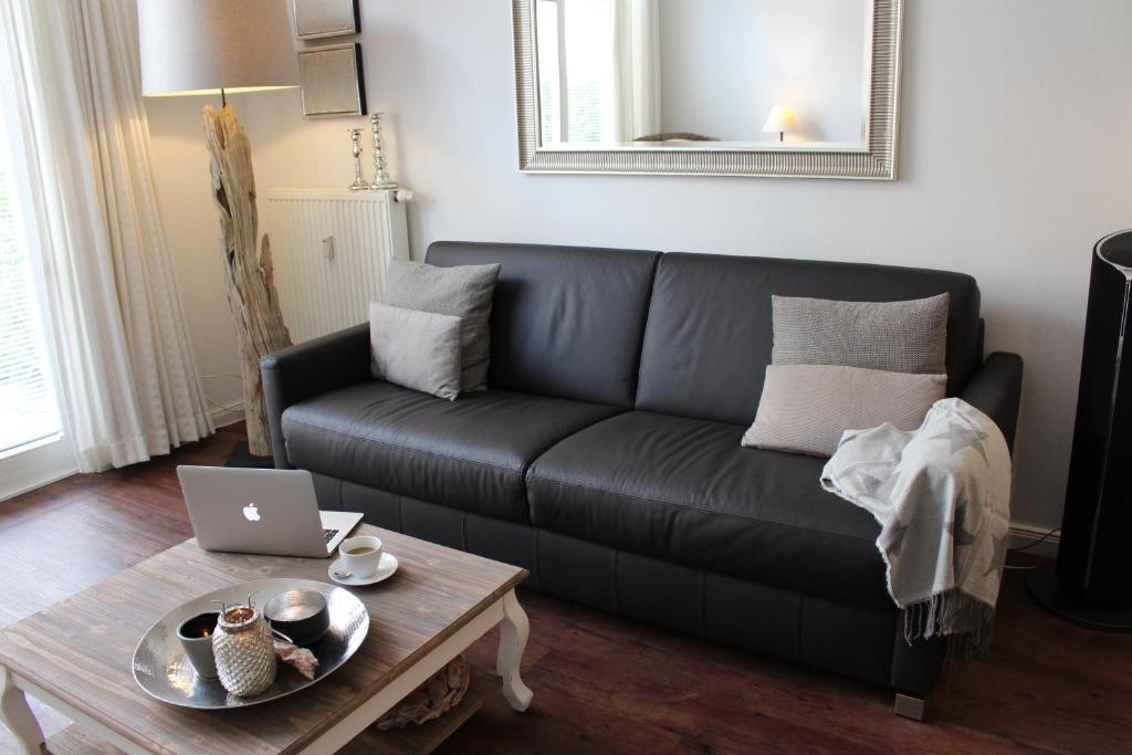 Posezení v ubytování Meeresblick Wohnung 018
