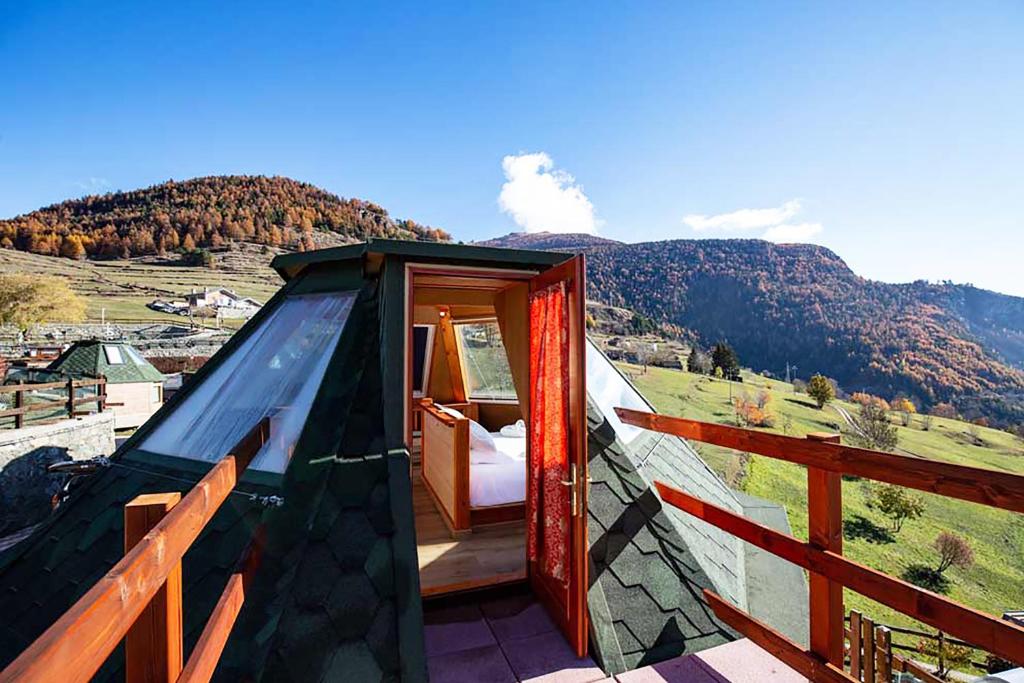 a room with a view of a mountain at DalaiLama Village in Antey-Saint-André