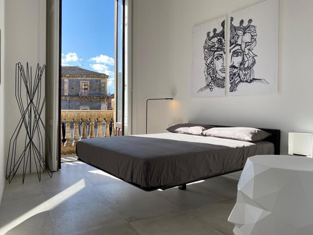 Postel nebo postele na pokoji v ubytování Panorama sur l'Opera
