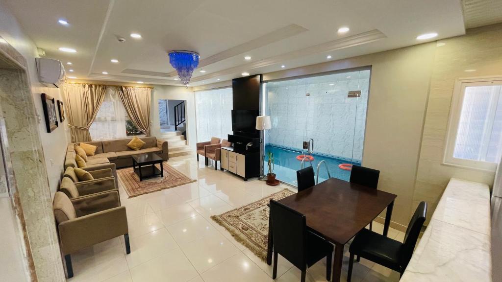 Posezení v ubytování وشل للشقق المخدومة واحة الغروب سابقا Washal Serviced Apartments