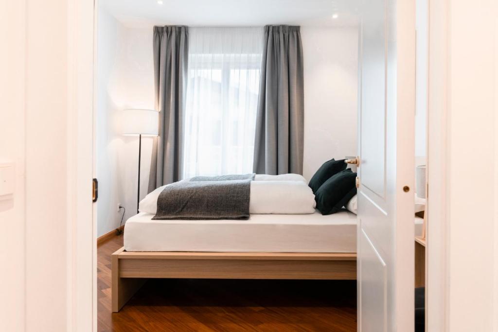 Postel nebo postele na pokoji v ubytování Feichter Hotel & Bistro