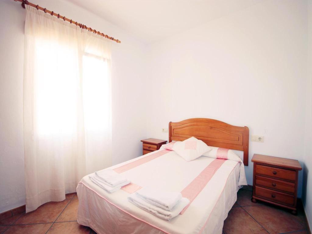 Postel nebo postele na pokoji v ubytování Villa- Caleta